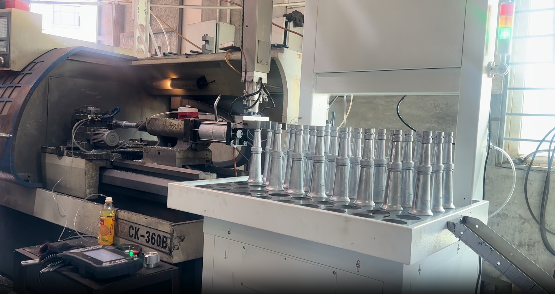 Automated pin cutting for fire hose nozzle